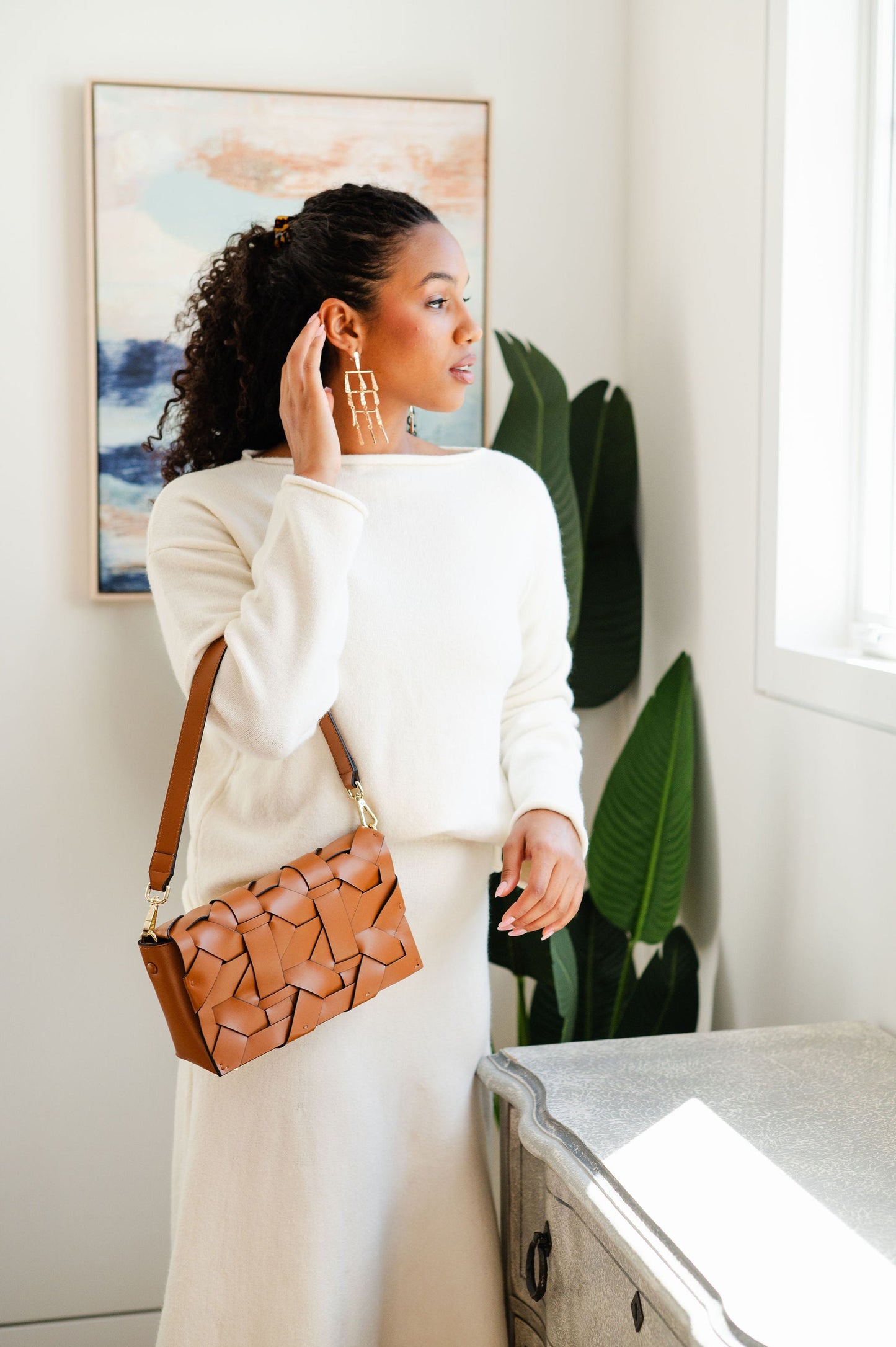 THE ZENOBIA WOVEN CLUTCH BAG