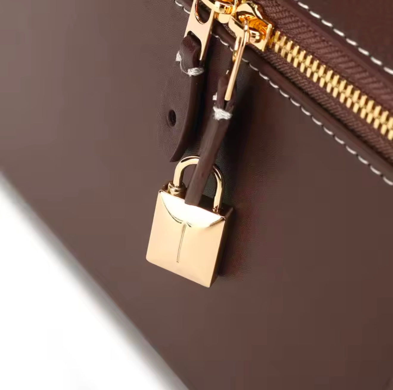 THE ZELMA LEATHER BAULETTO HANDBAG