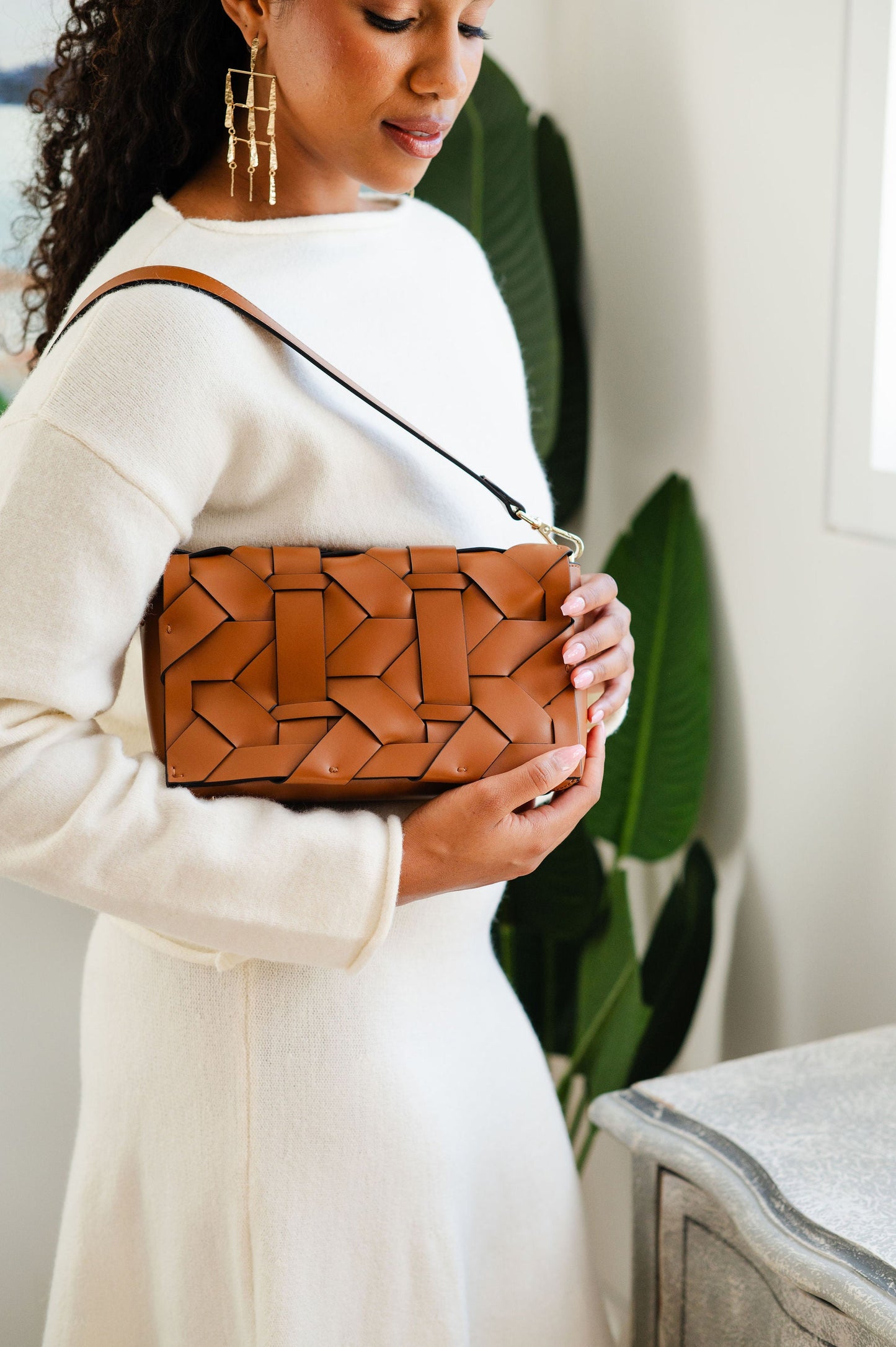 THE ZENOBIA WOVEN CLUTCH BAG