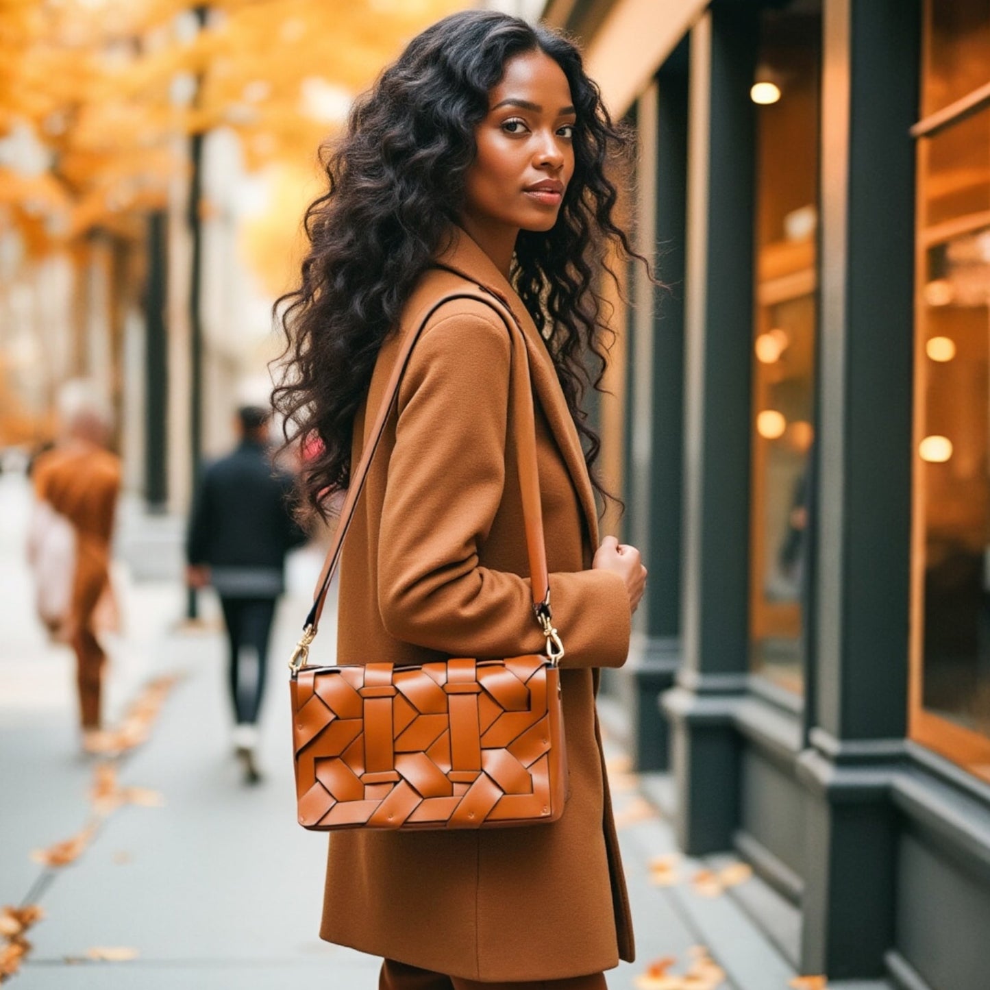 THE ZENOBIA WOVEN CLUTCH BAG