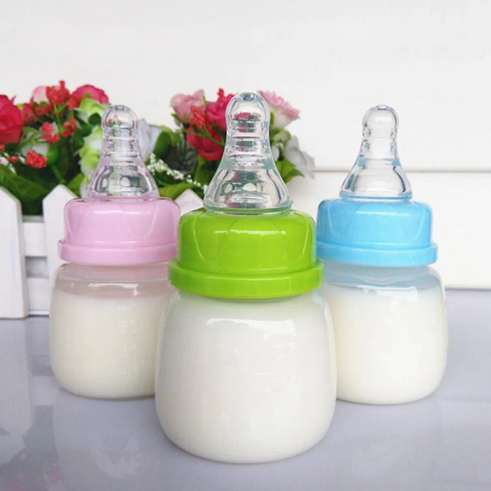 Mini Portable Feeding Baby Nursing Bottle BPA Free Safe Feeder Fruit Juice Milk Bottles 60ML